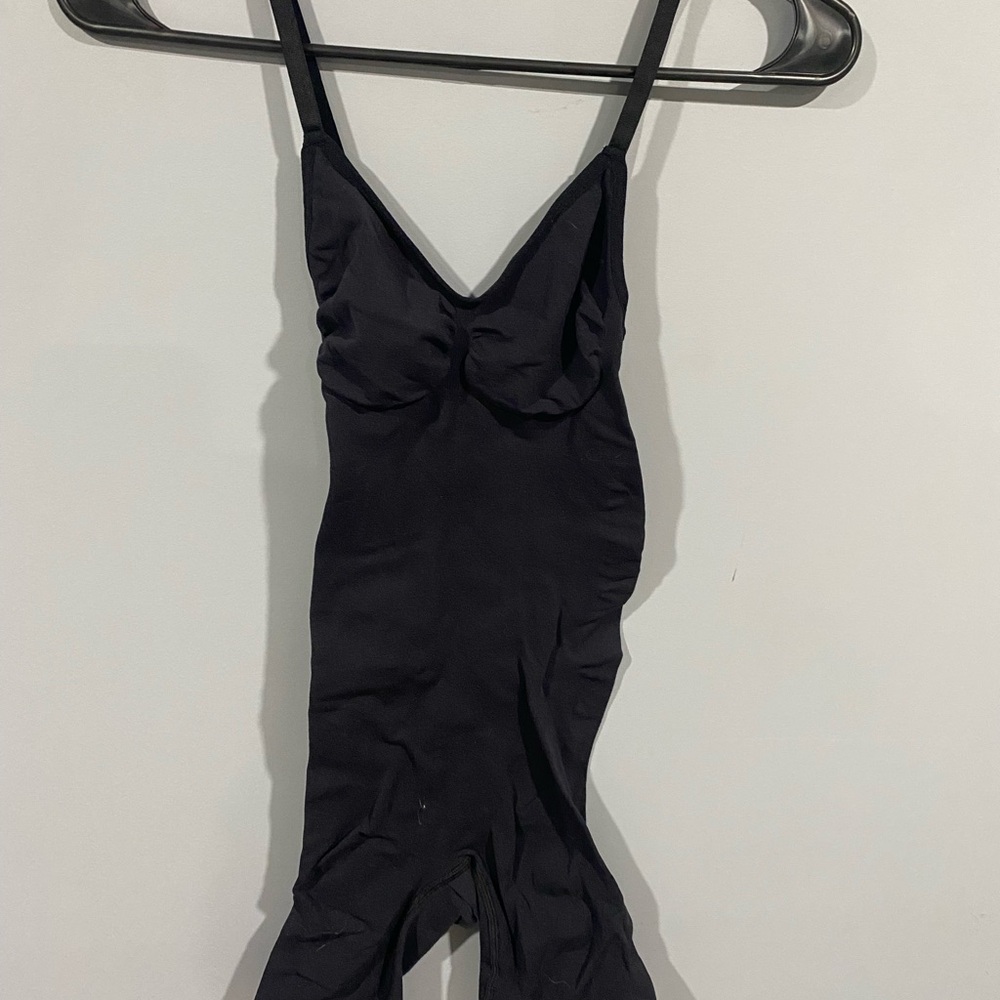 Black shape wear bodysuit